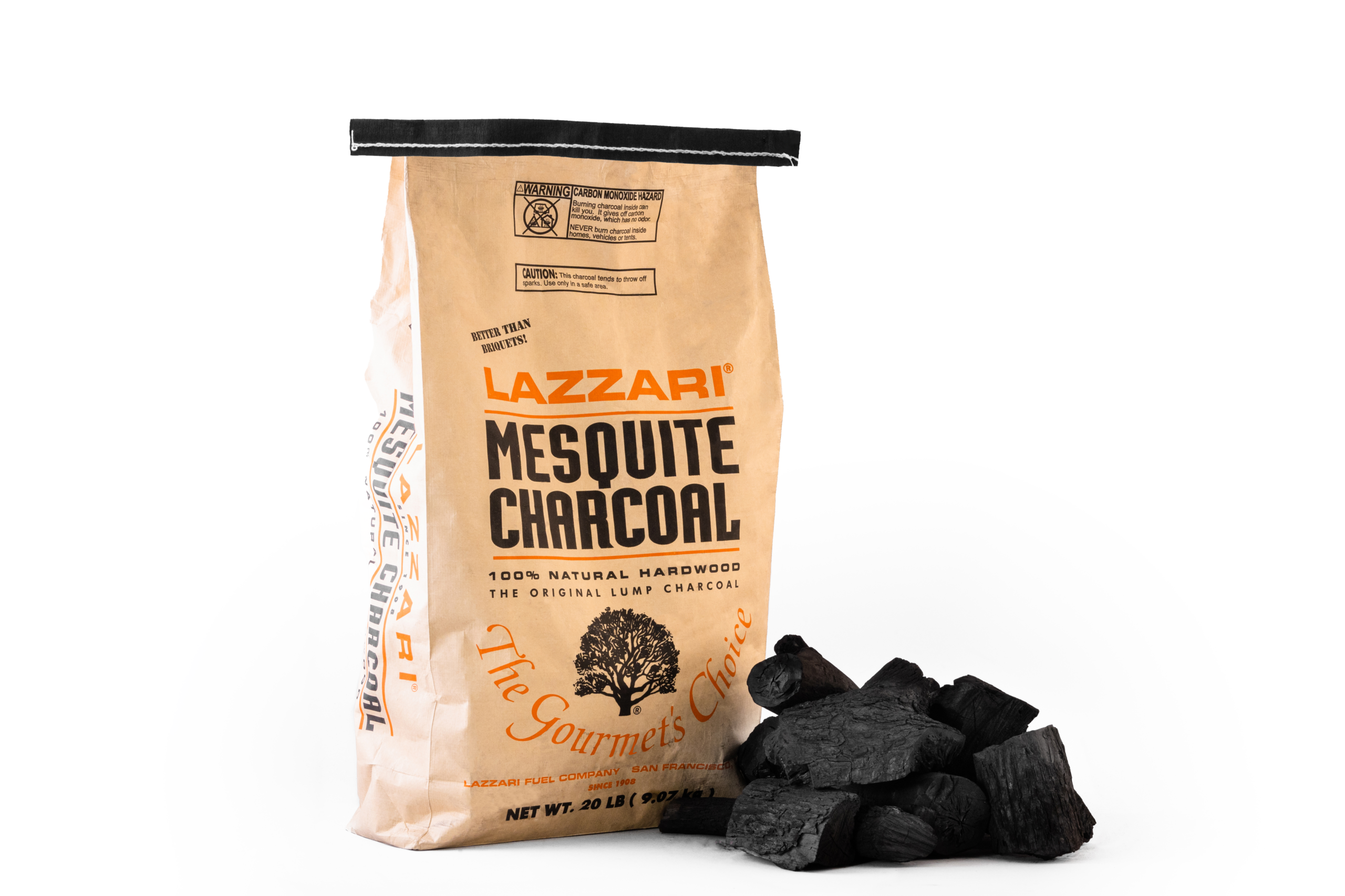 Lazzari Mesquite Charcoal Bag With Natural Hardwood Pieces Beside It, Emphasizing Quality For Gourmet Grilling And Cooking.
